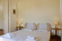 Postel nebo postele na pokoji v ubytování Hotel Omiros