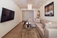Televízia a/alebo spoločenská miestnosť v ubytovaní Maison Downtown Luxury Apartments!