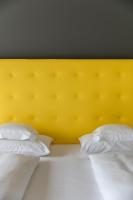 Posteľ alebo postele v izbe v ubytovaní Hotel Aurora