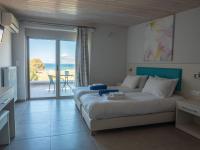 Posteľ alebo postele v izbe v ubytovaní Enali Villas