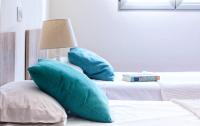 A bed or beds in a room at Frentemar 2 Deluxe