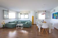 A seating area at Frentemar 2 Deluxe
