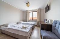 Posteľ alebo postele v izbe v ubytovaní Eskapada