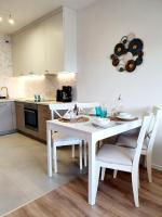 Kuchyňa alebo kuchynka v ubytovaní Apartament Szyszka Izerski Resort - strefa z sauną