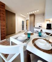 Posedenie v ubytovaní Apartament Szyszka Izerski Resort - strefa z sauną