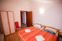 Postel nebo postele na pokoji v ubytování Apartments Marinić