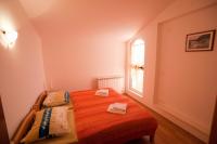 Postel nebo postele na pokoji v ubytování Apartments Marinić