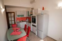 Kuchyň nebo kuchyňský kout v ubytování Apartments Marinić