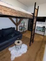 Posteľ alebo postele v izbe v ubytovaní Bergglück - gemütliches Appartement am Traunsee
