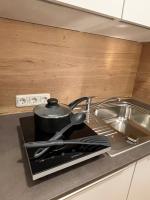 Kuchyňa alebo kuchynka v ubytovaní Bergglück - gemütliches Appartement am Traunsee