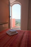 Postel nebo postele na pokoji v ubytování Apartments Marinić