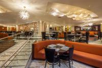 a restaurant with tables and chairs and a bar at Moon Palace Nizuc - All Inclusive in Cancún