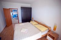 Postel nebo postele na pokoji v ubytování Apartments Marinić