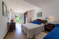 Posteľ alebo postele v izbe v ubytovaní Hotel Antares