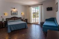 Posteľ alebo postele v izbe v ubytovaní Hotel Antares