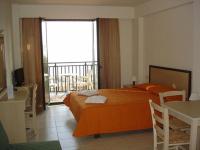 Postel nebo postele na pokoji v ubytování Margarita Beach Hotel