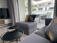Posedenie v ubytovaní Całkowicie nowy Apartament przy plaży