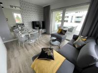 Posedenie v ubytovaní Całkowicie nowy Apartament przy plaży
