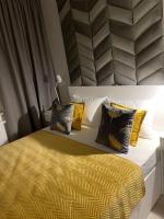 Posteľ alebo postele v izbe v ubytovaní Całkowicie nowy Apartament przy plaży