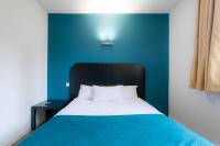 Een bed of bedden in een kamer bij Audotel