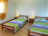 Postel nebo postele na pokoji v ubytování Apartment Vesna by Interhome