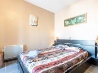Posteľ alebo postele v izbe v ubytovaní Apartment Port Salins by Interhome
