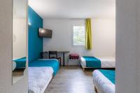 Een bed of bedden in een kamer bij Audotel