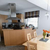 A kitchen or kitchenette at Glemmy Appartements inkl Sommercard