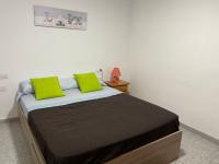Postel nebo postele na pokoji v ubytování Vivienda Vacacional a 50 Metros de la Playa