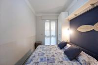 Posteľ alebo postele v izbe v ubytovaní Victoria Apartments Acquarius