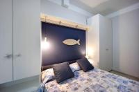 Posteľ alebo postele v izbe v ubytovaní Victoria Apartments Acquarius
