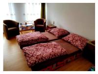 Łóżko lub łóżka w pokoju w obiekcie Penzión Larix Blatnica