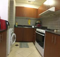 Kuchyň nebo kuchyňský kout v ubytování Octavius Holiday Home, Large 2 Bedroom Apartment near Global Village & Outlet Mall