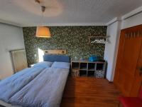 A bed or beds in a room at Haus Peter