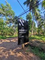 NIVADOO RESORT SIGIRIYAに飾ってある許可証、賞状、看板またはその他の書類