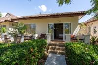 a home with a pathway leading to the front door at Gooddays Lanta Beach Resort SHA in Ko Lanta