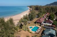an aerial view of a resort with a swimming pool and a beach at Gooddays Lanta Beach Resort SHA in Ko Lanta