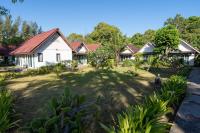 a view of a house with a yard at Gooddays Lanta Beach Resort SHA in Ko Lanta