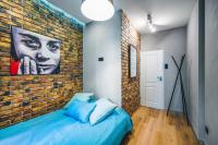 Posteľ alebo postele v izbe v ubytovaní Apartament Przy Żurawiu