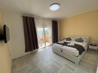 Postel nebo postele na pokoji v ubytování Villa Diana