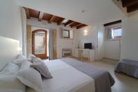A bed or beds in a room at Life Hotels Kalaonda Resort
