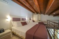 A bed or beds in a room at Life Hotels Kalaonda Resort
