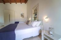 A bed or beds in a room at Life Hotels Kalaonda Resort