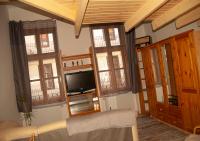 Televízia a/alebo spoločenská miestnosť v ubytovaní Western apartman