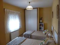 A bed or beds in a room at Casa de la Abuela Pili