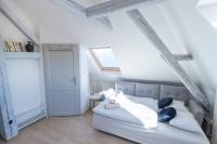 Posteľ alebo postele v izbe v ubytovaní Olymp apartment
