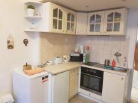 Kuchyň nebo kuchyňský kout v ubytování Get Prague Flat Slovenska