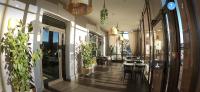 L'Aptois Hôtelにあるレストランまたは飲食店