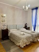 Posteľ alebo postele v izbe v ubytovaní Giulia apartment and room