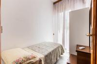 A bed or beds in a room at Paco House